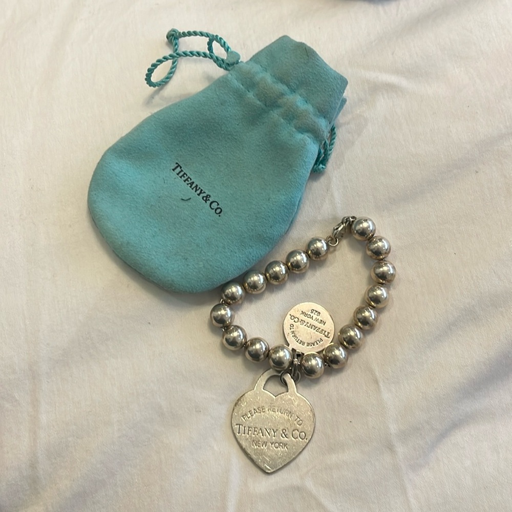 Tiffany bead bracelet with two charms
